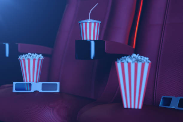 istock 3D illustration with popcorn, 3d glasses and chairs, with blue light. Concept cinema hall and theater. Red chairs in the cinema hall. 1135297670