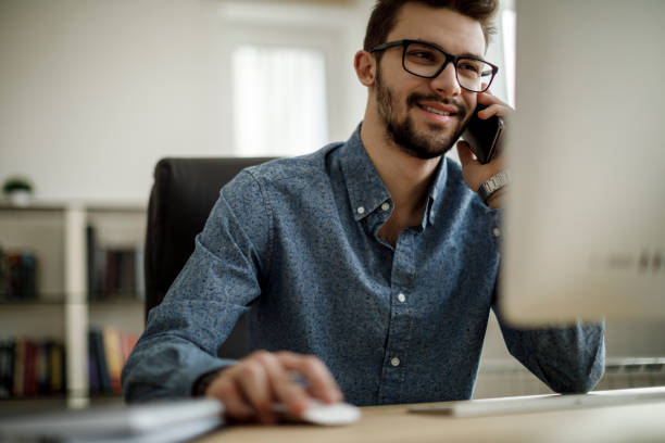 istock Young businessman talking on the phone 1135301107