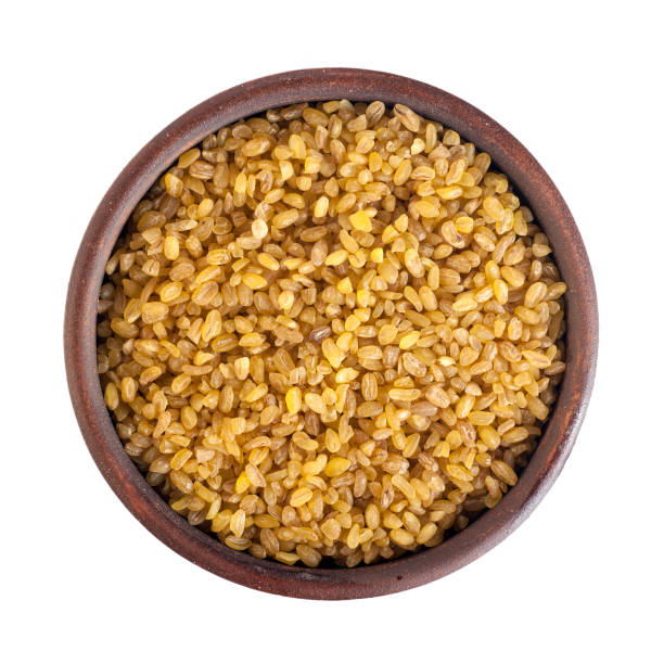 istock bulgur seeds, round ceramic cup, top view, isolated on white background 1135301330