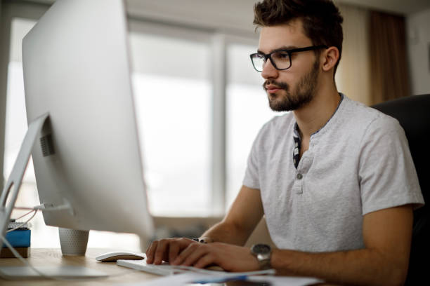 istock Teenage boy working at home 1135301425