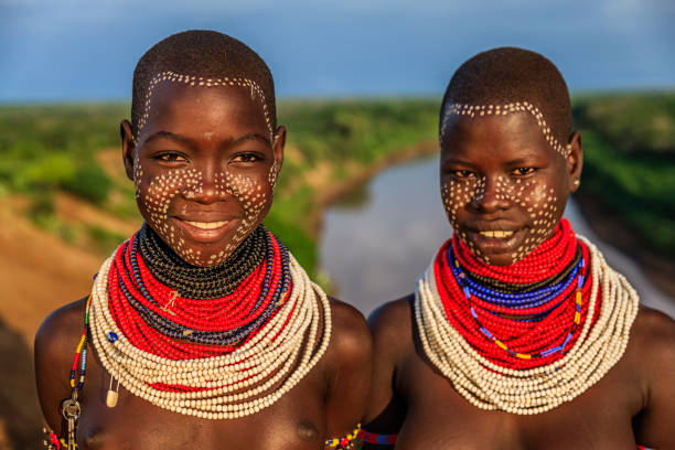 istock Young girls from Karo tribe, Ethiopia, Africa 1135301708