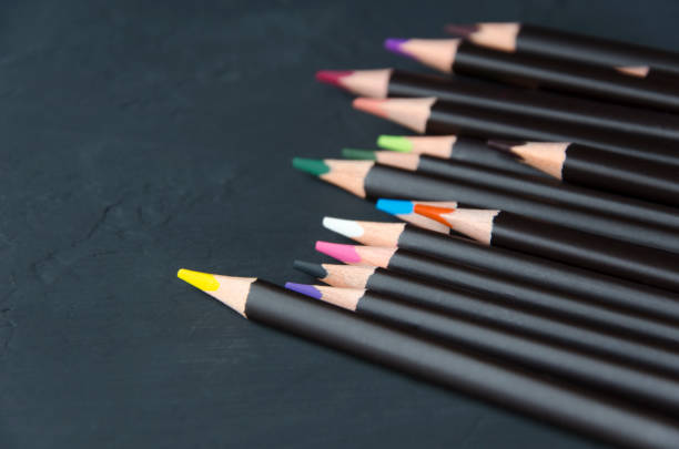istock Black colorful pencils on black background.Dark version 1135303041