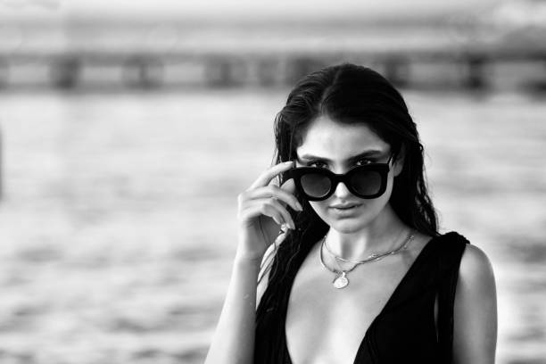 istock Natural pretty girl on beach 1135306568