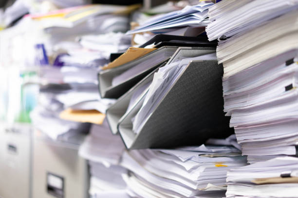 istock Many filing cabinets in a messy office without mess. 1135307894