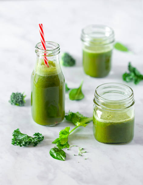 istock Fresh Green Juice Made from Leafy Greens 1135308336