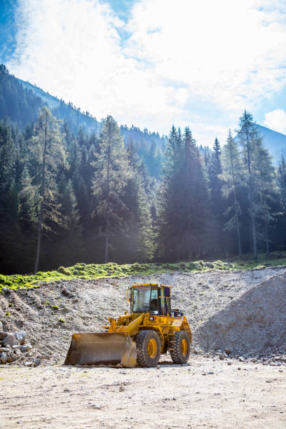 istock Yellow wheel loader excavator in a quarry 1135309124