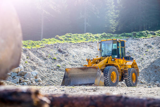 istock Yellow wheel loader excavator in a quarry 1135309516