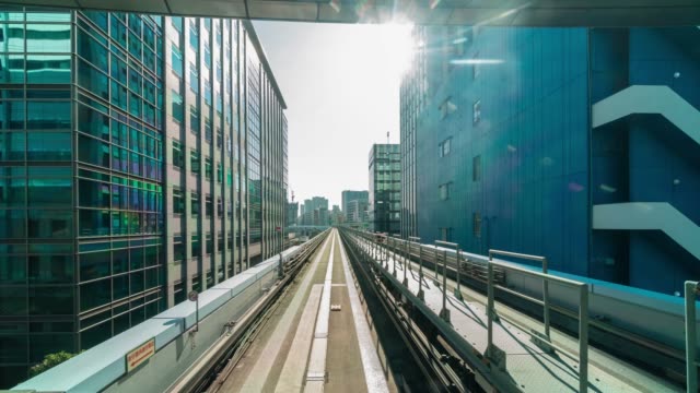 4K Time lapse of Futuristic scene Motion blur movement from Tokyo japan train of Yurikamome Line moving between tunnel in Tokyo, Japan