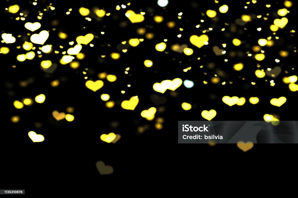 Hearts bokeh overlay, abstract background, shiny gold hearts bokeh Gold and yellow hearts bokeh overlay, hearts photo overlay, abstract background, shiny gold and yellow hearts flowing around. Photo overlay effect, hearts bokeh on black background, JPG file. Abstract Stock Photo