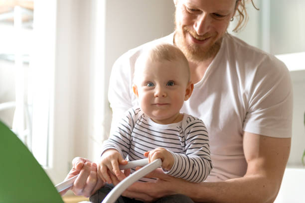 istock Smiling boy enjoying the day with his father 1135311545