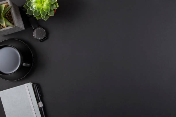 istock Office Desk with Succulent Plant 1135313109