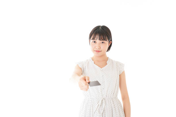 istock Young woman paying with credit card 1135314611