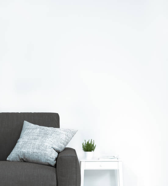 istock Sofa in front of simple white wall with decorative items empty room,open door,3d rendering luxury living room modern mid century room interior home design vertical image for copy space text 1135315914