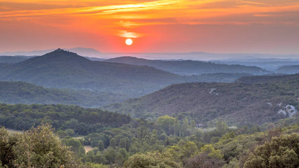istock Orange Sunrise over Cevennes national park 1135316136