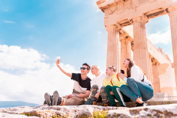 istock Group of young tourists in Acropolis - Athens 1135316481
