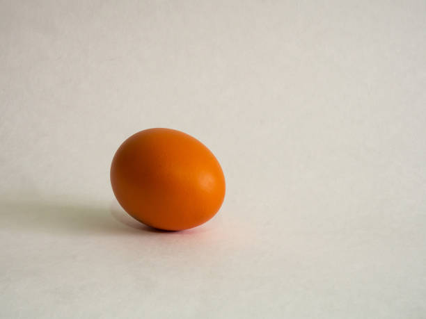 istock Eggs of brown color prepare for Easter on a light background 1135319420
