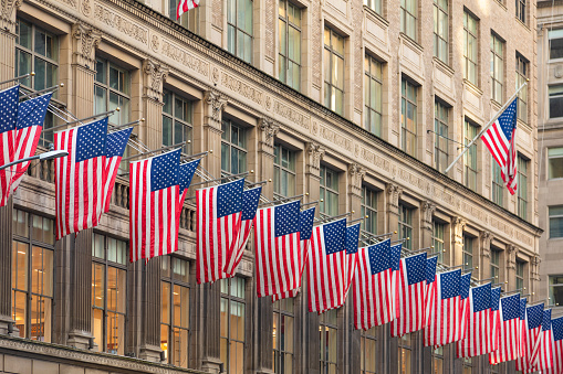 American Flags Against Office Building