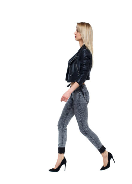 istock side view of walking woman. 1135322443