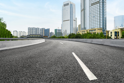 empty highway with cityscape and skyline of chengdu,China.