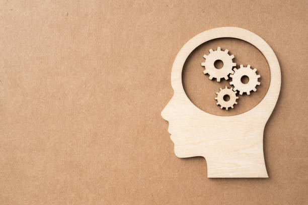 istock wooden man head silhouette with infinity icon 1135324072