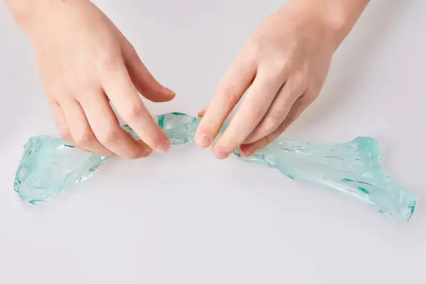 Photo of hand holding a slime