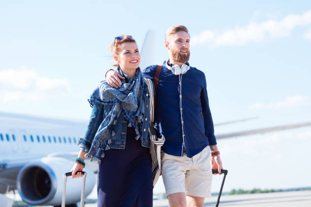 istock Couple arriving after their vacation 1135324693