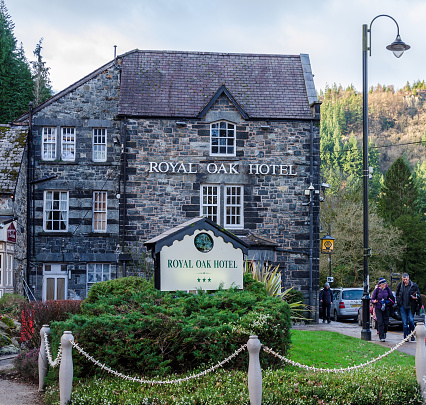 Betws y Coed, UK - Feb 2, 2019: The Royal Oak Hotel in Betws y Coed provides dining & accomodation to travellers and tourists. A former coaching inn, the hotel is located on the historic A5 road.