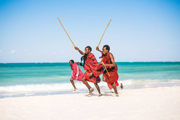 istock Masai Warriors On The Beach 1135324875