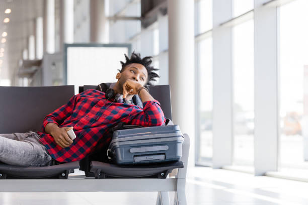 istock Traveler rest in the transit lounge at the terminal 1135325695