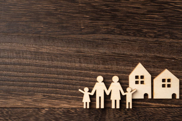 istock wooden family piece with love, secure concept 1135326070