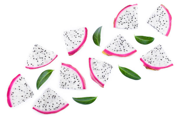 piece of Dragon fruit, Pitaya or Pitahaya with leaves isolated on white background with copy space for your text. Top view. Flat lay piece of Dragon fruit, Pitaya or Pitahaya with leaves isolated on white background with copy space for your text. Top view. Flat lay. pitaya photos stock pictures, royalty-free photos & images