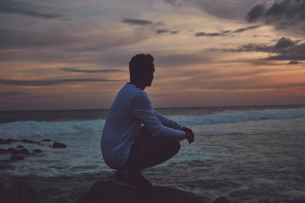istock Man enjoying on the beach. 1135326386