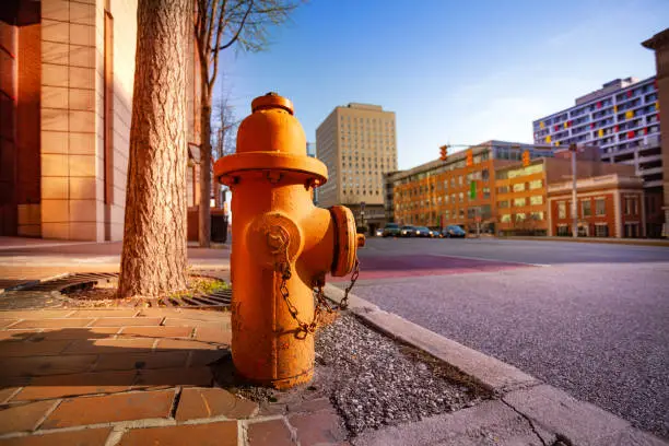 Photo of Fire hydrant on sidewalk of Baltimore city, USA