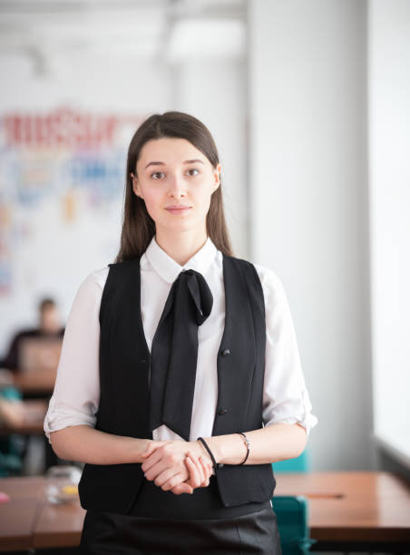 istock Young business lady standing in the office in a work clothes 1135329736