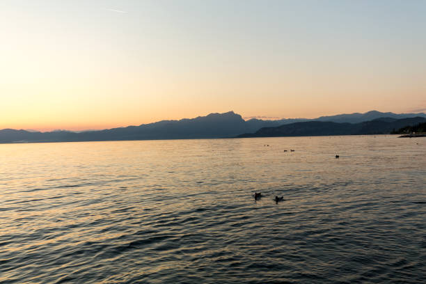 istock Beautiful sunset at Garda lake in Italy 1135334330