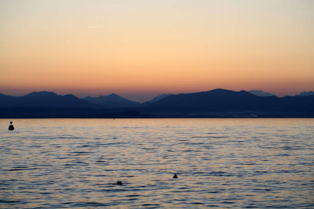 istock Beautiful sunset at Garda lake in Italy 1135334511