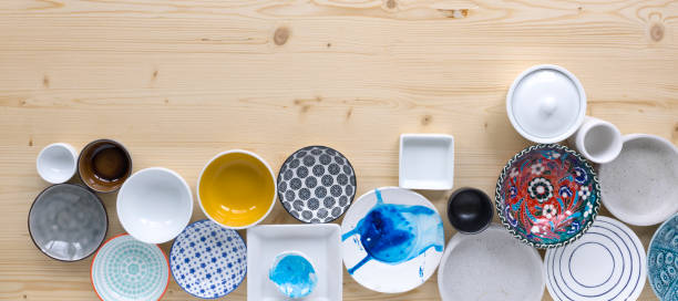 istock different kinds of modern colourful and white crockery in different designs on light wood background 1135336525