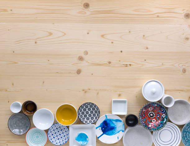 istock different kinds of modern colourful and white crockery in different designs on light wood background 1135336530