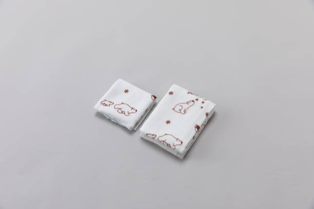 istock Cartoon towels folded on a grey background 1135341068