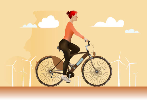 mujer, bicicleta eléctrica y turbinas eólicas. - wind turbine motion alternative energy wind power fotografías e imágenes de stock