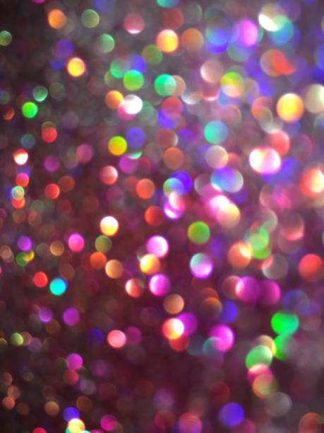 istock Multicolored bokeh and Christmas defocused light background 1135343338