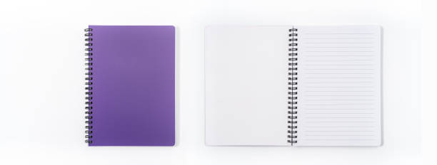 istock Brown spiral notebook isolated on white background.top view 1135346223