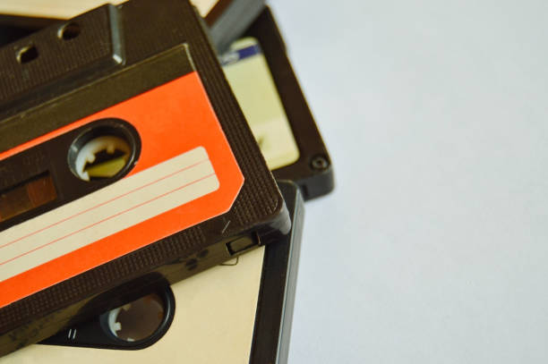 istock Red and white old audio cassette background with copy space. 80s-90s. Close-up 1135346784