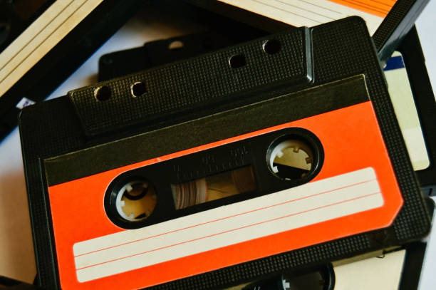 istock Red old audio cassette background. 80s-90s. Close-up 1135346788