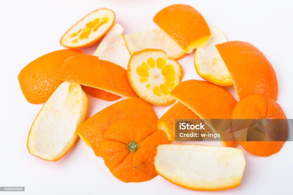 Orange peels on heaps, view from above Food residues of oranges Peel - Plant Part Stock Photo