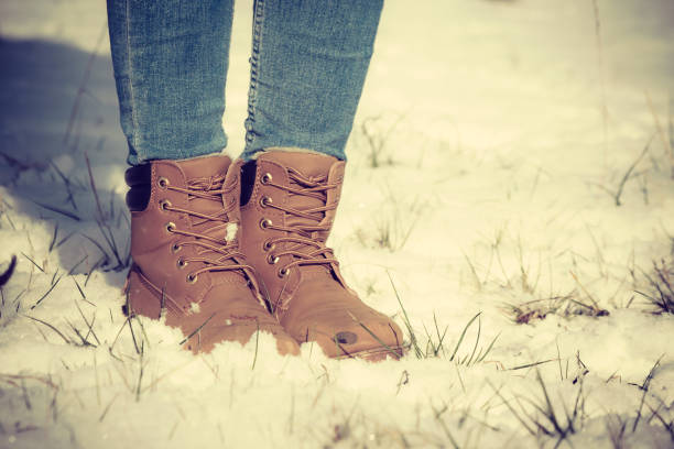istock Woman wearing brown winter boots 1135348265