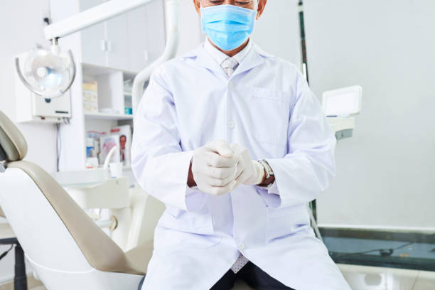 istock Dentist sitting in dental clinic 1135349258