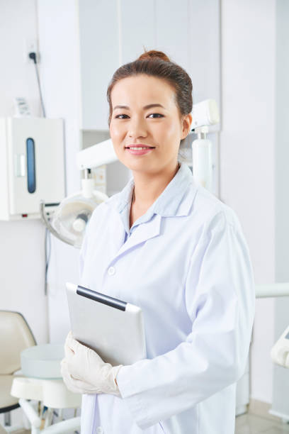 istock Young dentist in dental clinic 1135350407