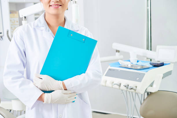 istock Dentist standing in dental clinic 1135350410