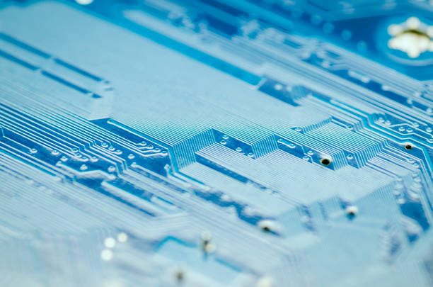 istock Lines of conductors on a blue printed circuit Board 1135353869